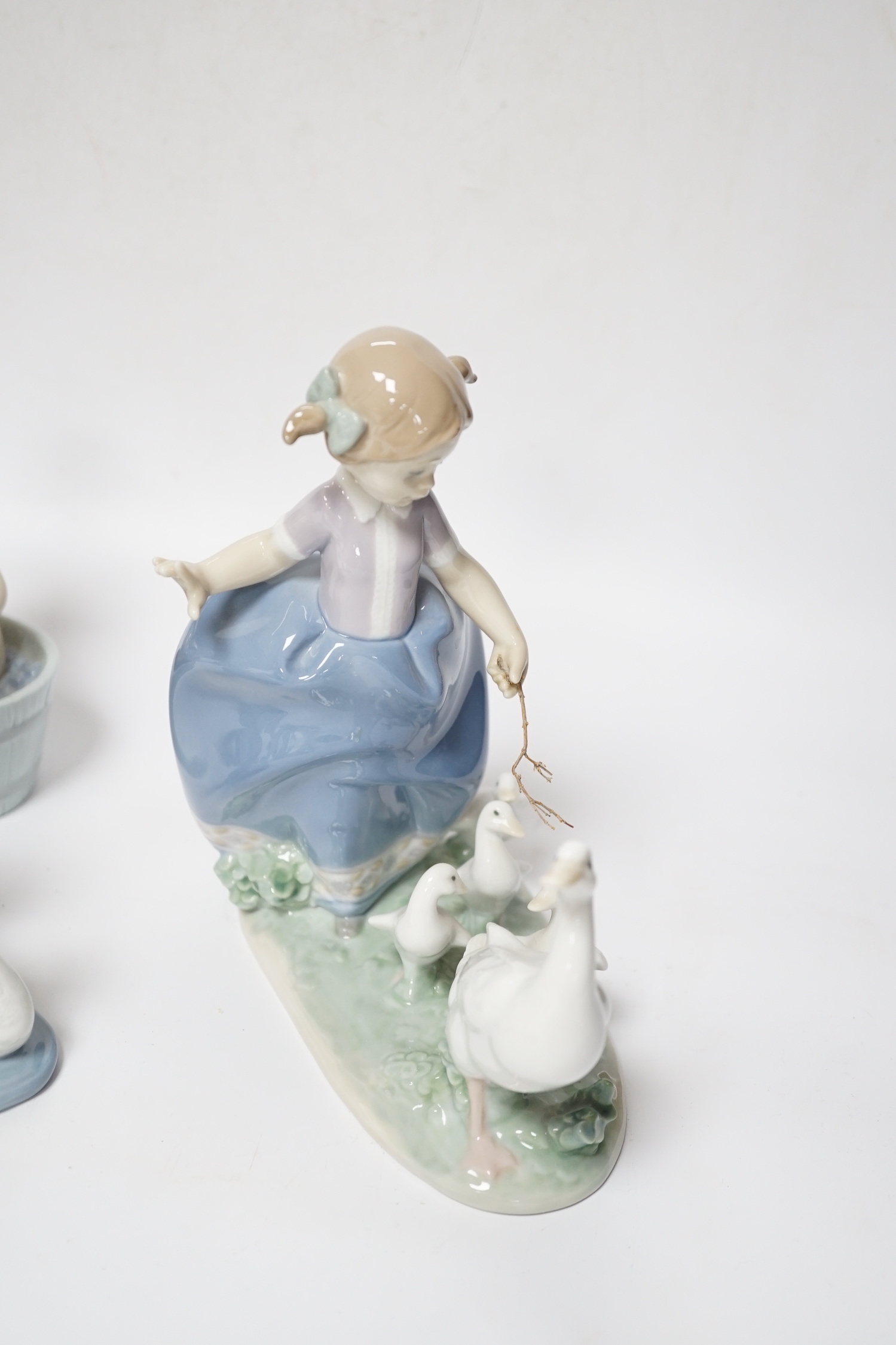 Five Lladro figure groups, Follow Me, Hurry Up, Bathtime, Interrupted Nap and another, four boxed